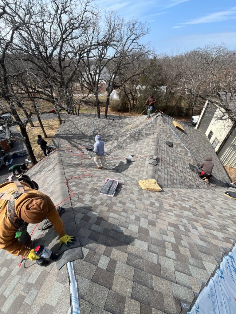 Roofing Redefined team performing residential roof replacement and repairs in Dallas-Fort Worth.