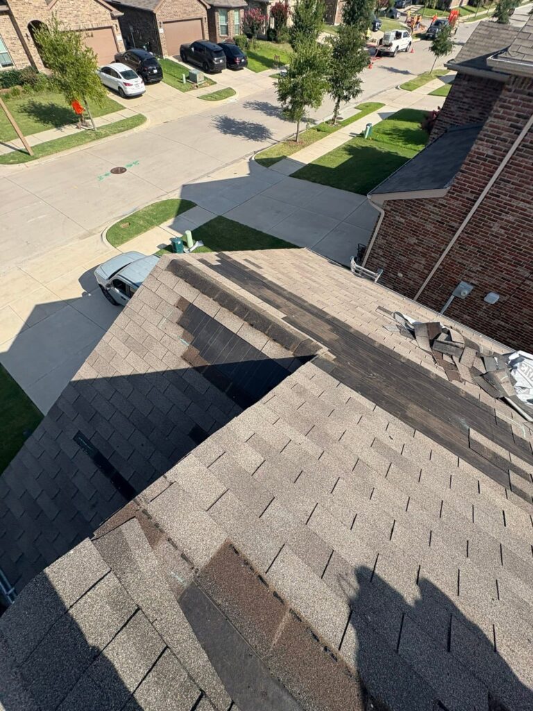 Completed residential roof repair and shingle replacement project by Roofing Redefined in Dallas-Fort Worth.