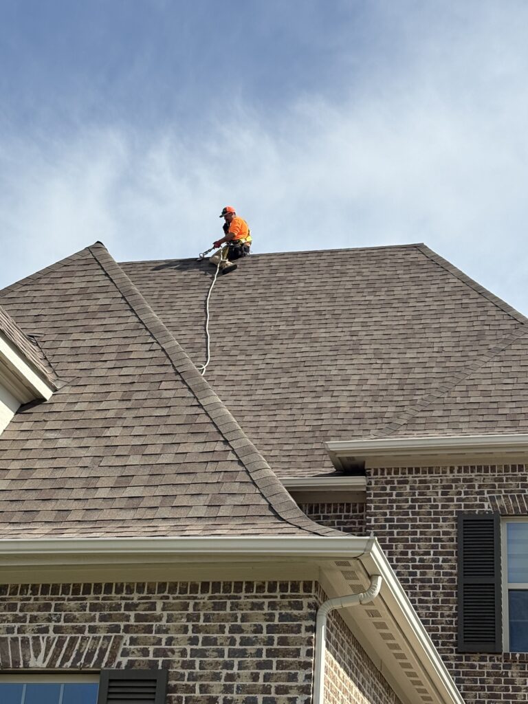 Roofing Redefined contractor performing roof inspection and repair in the Dallas-Fort Worth Metroplex.