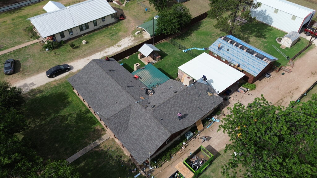 Aerial view showcasing a completed roofing project by Roofing Redefined in the Dallas-Fort Worth Metroplex